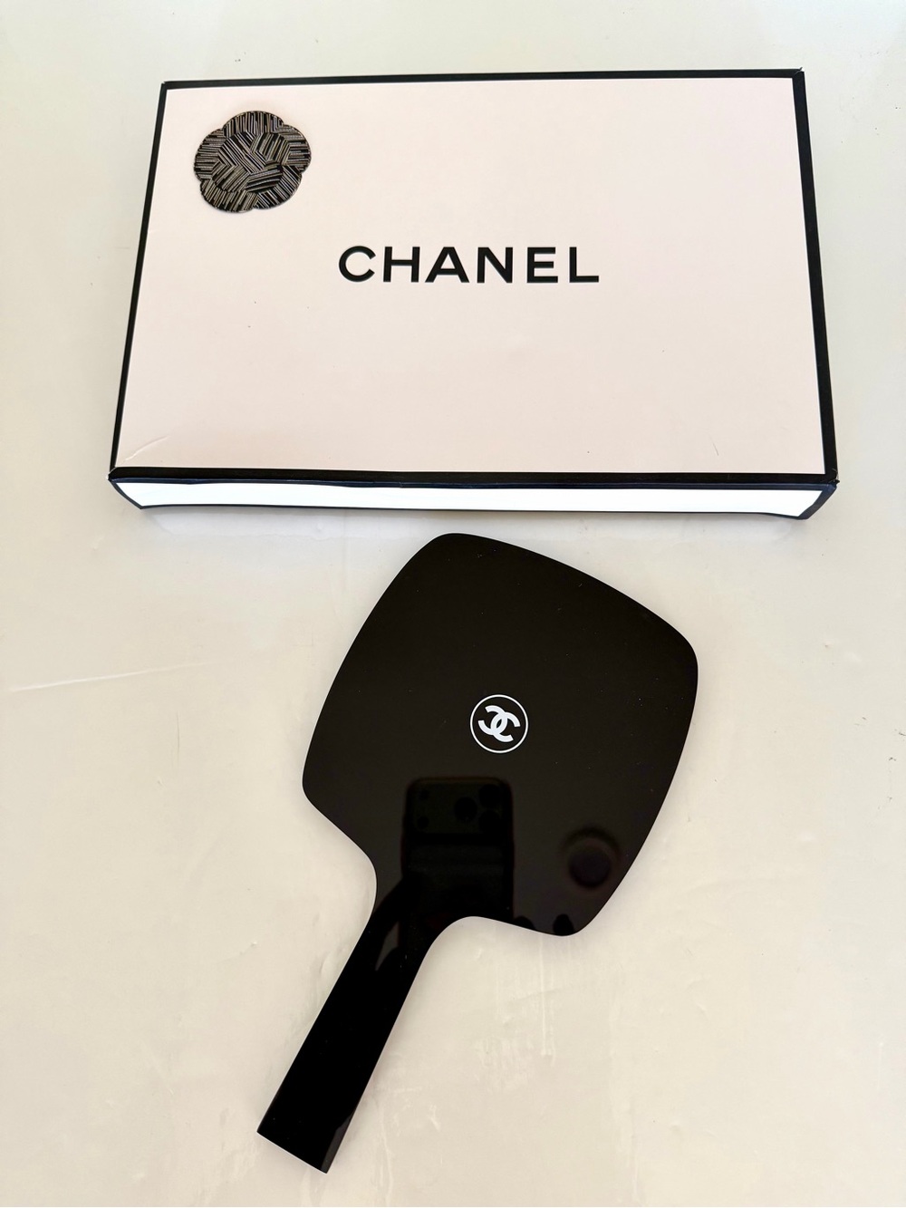 CHANEL Black Handheld Mirror with White CC Logo